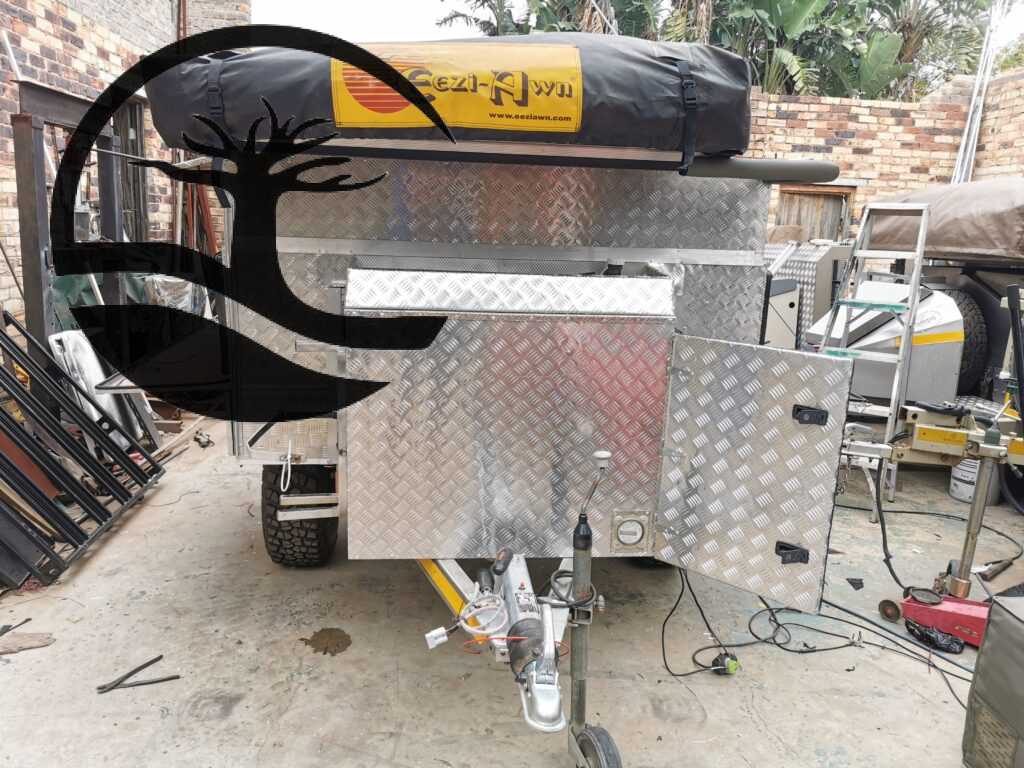 Completed Custom Remodeling of a B'rakah Camping trailer with Aluminum treat plate boxes and nosecone.