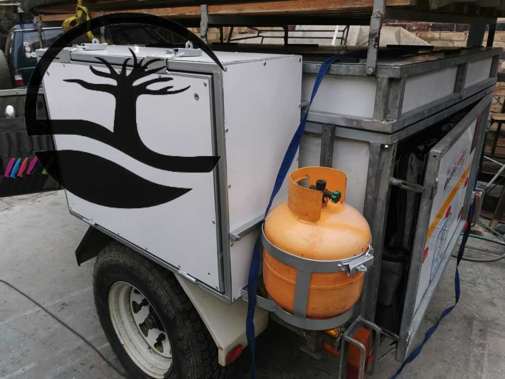 Custom made steel kitchen box to match existing finishes fitted to a Buzzard camping trailer.