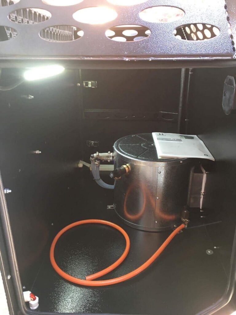 Custom Hot and Cold water installation with a Hansen gas and 220v built in geyser fitted to a Metalian Maxi Camping Trailer.