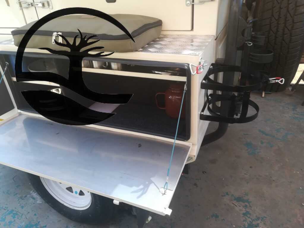 Custom Canvas caddie bags and a custom made aluminium kitchen box fitted to a Jurgens XT camping trailer.