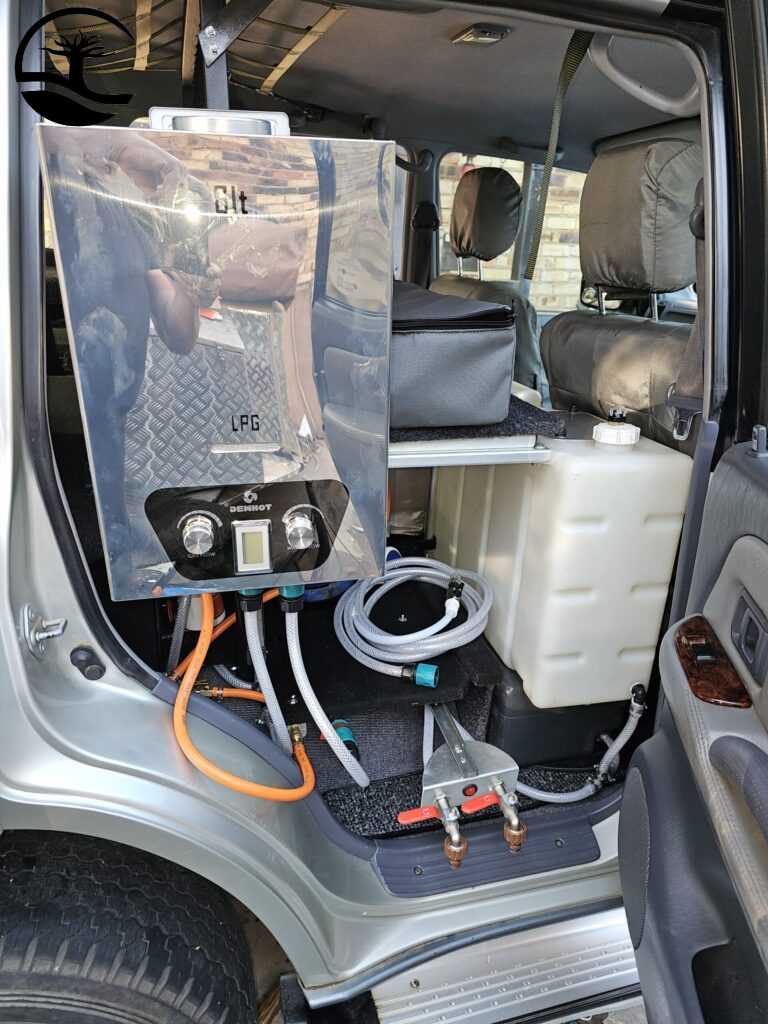 Custom Built Water and Geyser System for an overland vehicle built into an Expedition Built Toyota Prado. The geyser is connected for use.